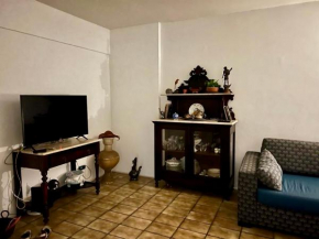 Suite aconchegante na Torre